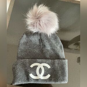Grey Knitted Beanie with Lt. Grey  Pom Pom and Interlocking Logo